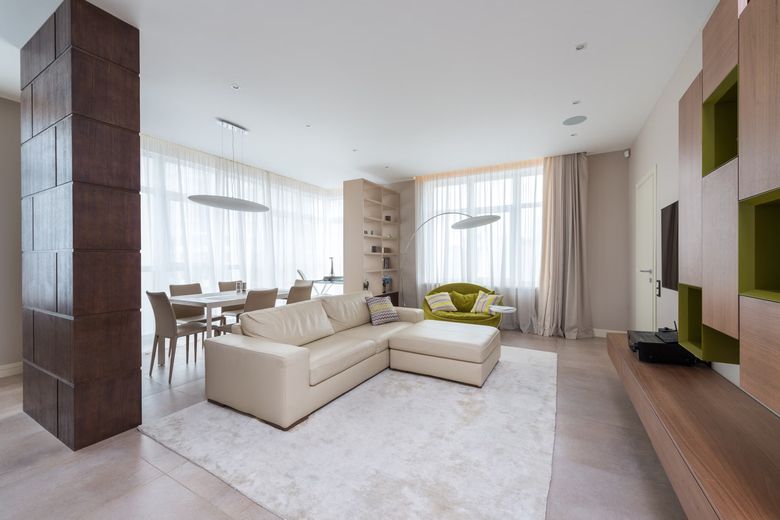 Сколько функциональных зон оптимально для гостиной 50-70 м²?